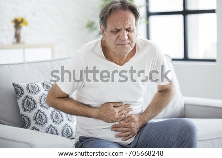 Senior man with stomach pain