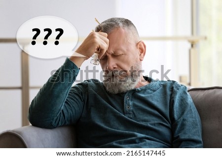 Senior man suffering from dementia at home. Illustration of speech bubble with question marks
