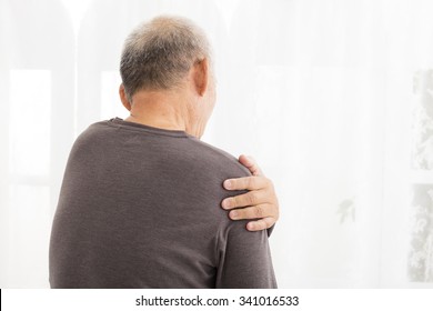 Senior Man Suffering In Shoulder Pain