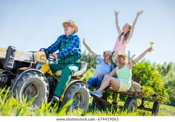 blue ride on tractor