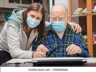 Senior Man With Their Caregiver At Home During Coronavirus Pandemia. Concept Of Health Care For Elderly Old People, Disabled