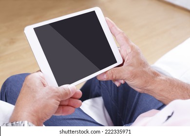 Senior Man Using Digital Tablet 