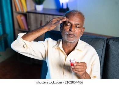 Senior Man Using Pain Relief Balm For Headache - Concept Of Massage Ointment For Migraine, Stress Relief And Painkiller.