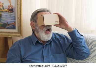 Senior Man Using VR Cardboard