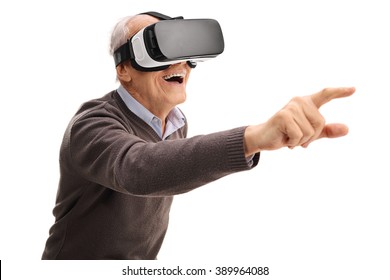 Senior man using a VR headset and reaching with his hand isolated on white background