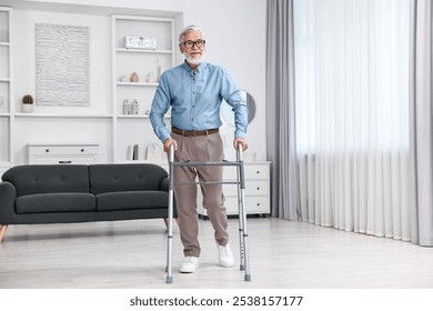 Senior man using walking frame at home - Powered by Shutterstock