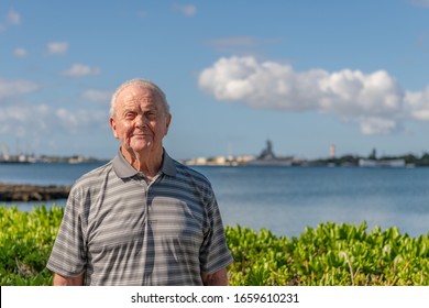 A Senior Man, A Veteran, Visiting Historical Sites During A Family Trip To Hawaii.