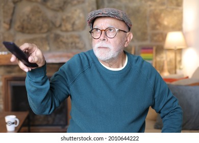 Senior Man Watching Tv At Home