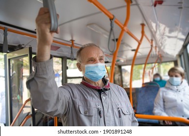  Senior man  wearing medical face mask sitting in the bus transport. - Powered by Shutterstock