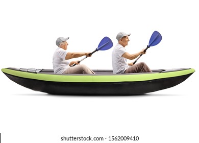 Senior Man And Woman In A Kayak With Paddles Isolated On White Background