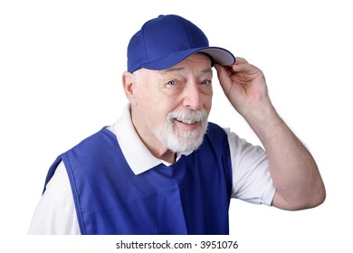 A Senior Man Working As A Greeter Tips His Hat To Welcome You To The Store.  Isolated On White.