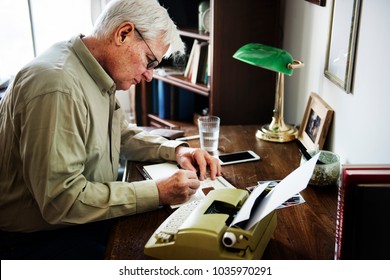 Senior Man Writing