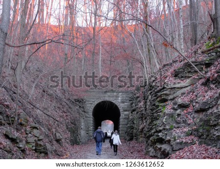 Similar – Man in tunnel (2) Movement