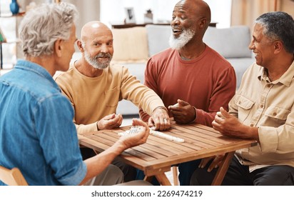 Senior men, friends and dominoes in board games on wooden table for activity, social bonding or gathering. Elderly group of domino players having fun playing and enjoying entertainment at home - Powered by Shutterstock