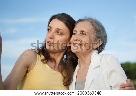 Similar – Image, Stock Photo Senior and young sportswoman looking away