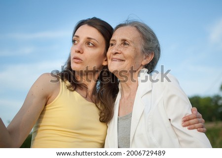 Similar – Image, Stock Photo Senior and young sportswoman looking away