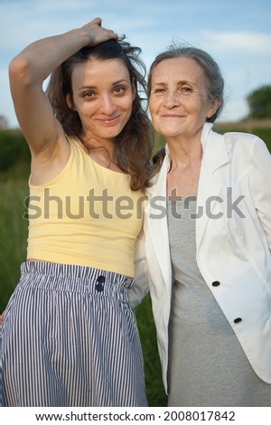 Similar – Image, Stock Photo Senior and young sportswoman looking away