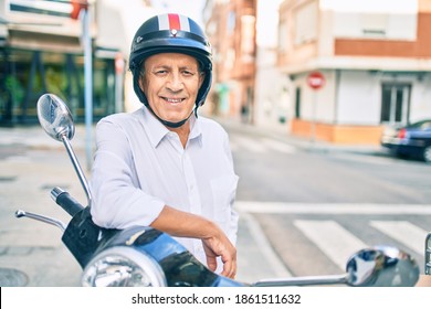 Senior Motorcyclist Man Smiling Happy Wearing Moto Helmet At The City.