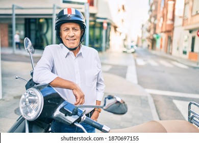 Senior Motorcyclist Man Smiling Happy Wearing Moto Helmet At The City.