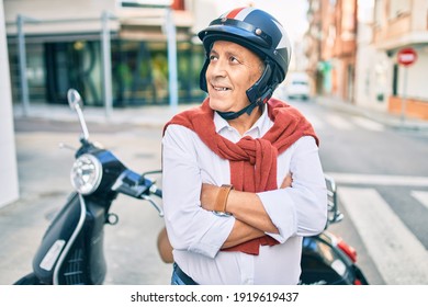 Senior Motorcyclist Man Smiling Happy Wearing Moto Helmet At The City.