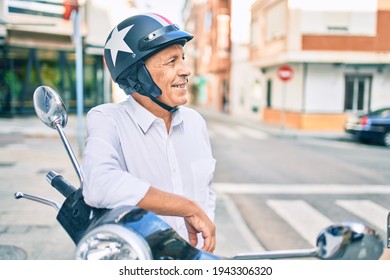 Senior Motorcyclist Man Smiling Happy Wearing Moto Helmet At The City.