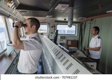 Senior Navigation Officer Navigating His Ship