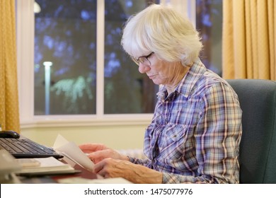 Senior Old Elderly Person Learning Computer And Online Pension And Banking Internet Skills Protect Against Fraud Uk