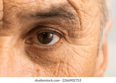 senior old man eyes close-up macro shot - Powered by Shutterstock