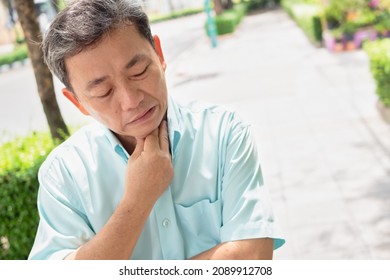 Senior Old Man Having Sore Throat, Flu Throat Inflammation