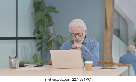 Senior Old Man Reacting to Online Loss on Laptop - Shutterstock ID 2274324797