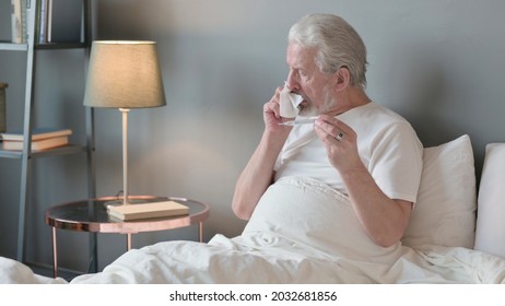 Senior Old Man Sneezing Checking Temperature In Bed, Thermometer