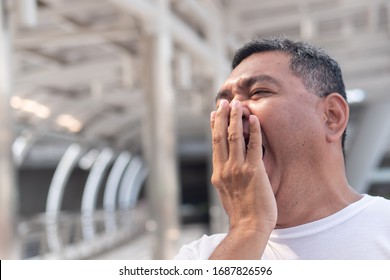 Senior Old Man Yawning; Tired Old Uncle Yawning From Tireness, Exhaustion, Overwork, Insomnia, Sleeplessness