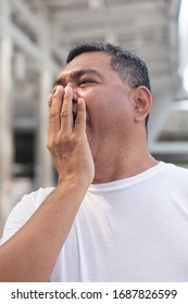 Senior Old Man Yawning; Tired Old Uncle Yawning From Tireness, Exhaustion, Overwork, Insomnia, Sleeplessness