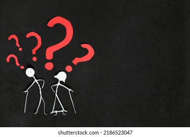 Senior Or Old People Dementia Problem, Memory Loss And Alzheimer's Disease Concept.  Elderly Couple Stick Figure With Red Question Mark In Dark Black Background Creative Composition.