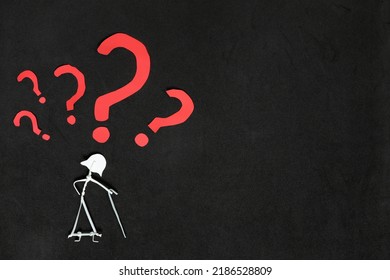 Senior Or Old People Dementia Problem, Memory Loss And Alzheimer's Disease Concept.  Elderly Woman Stick Figure With Red Question Mark In Dark Black Background Creative Composition.