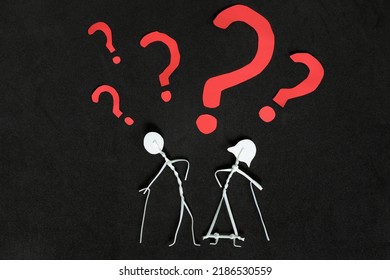 Senior Or Old People Dementia Problem, Memory Loss And Alzheimer's Disease Concept.  Elderly Couple Stick Figure With Red Question Mark In Dark Black Background Creative Composition.