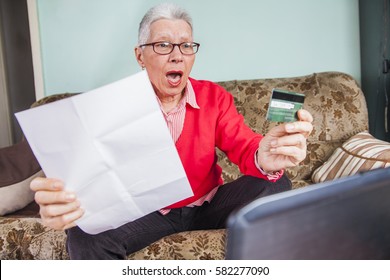 Senior Old Woman Shocked By Her Credit Card Bill