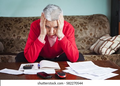 Senior Old Woman Worried With The Bills She Has To Pay, No Money To Cover Expenses