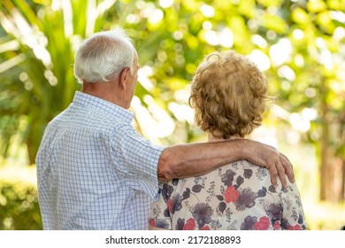 Senior Older Couple Cuddling Outdoors