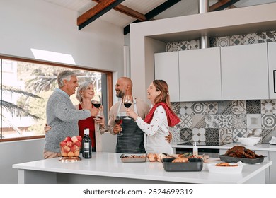 Senior parents, happy couple and drinking wine to toast for cooking food to celebrate Thanksgiving. Generations, daughter and son in law at dinner party with family of people in home kitchen together - Powered by Shutterstock