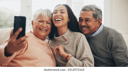 Senior parents, woman and selfie in home for memory, bonding and weekend with love or support. Happy people, tech and laughing together with excited for photography as cheerful family in living room - Powered by Shutterstock