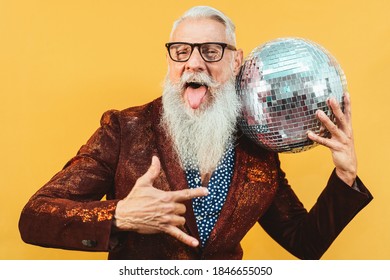 Senior party man celebrating new year's eve in disco club 