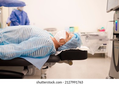 Senior Patient Lying Down And Waiting For Her Cataract Surgery