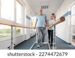 Senior Patient and physical therapist in rehabilitation walking exercises