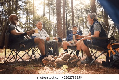 Senior people, friends and camping with coffee in nature for travel, adventure or summer vacation on chairs in forest. Group of elderly men relax, talking or enjoying camp out by trees in the woods - Powered by Shutterstock