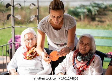 Senior People Having Origami Class