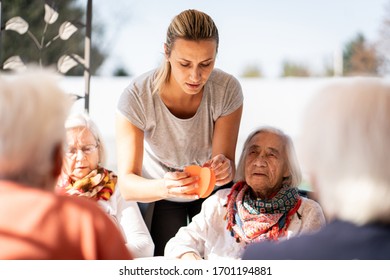 Senior People Having Origami Class