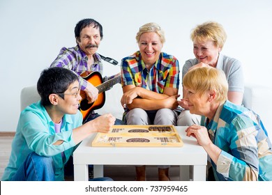 Senior People Playing Board Games