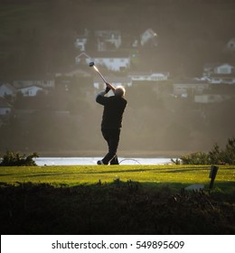 A Senior Plays Golf In Scotland