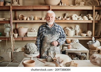 Senior Potter Making Sculptures From Clay